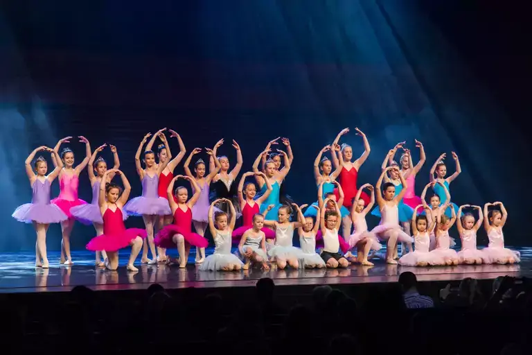 Children dancing on stage