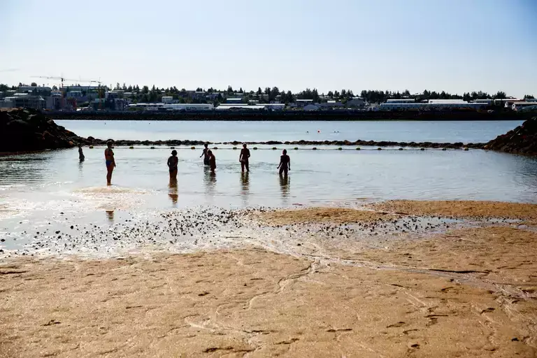 People on Nauthólsvík beach